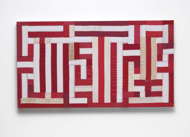 <p>Hank Willis Thomas (U.S., b. 1976).&nbsp;<em>Justice (red)</em>, 2021. Mixed media, including U.S. flags. Collection of Jordan D. Schnitzer. Photo: Aaron Wessling Photography.</p>
